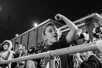A young fan celebrates a touchdown by the Goldbacks on game night.