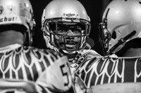 A Goldback football player waiting to go back into game.