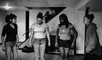 one of Mariana's daughters and her friends rehearse for a school dance. 